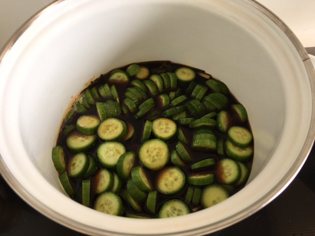 How to make Tsukemono: Put cucumbers into the cooking liquid